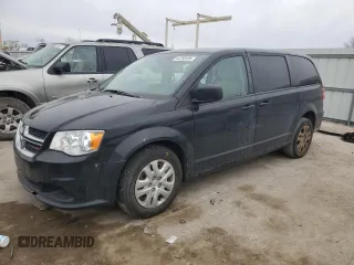2018 Dodge Grand Caravan SE with VIN 2C4RDGBGXJR137257, listed as a Copart auction lot 44750595 with 128,236 mi miles and Salvage Title. Bid and sale history available at DreamBid. Image 1.