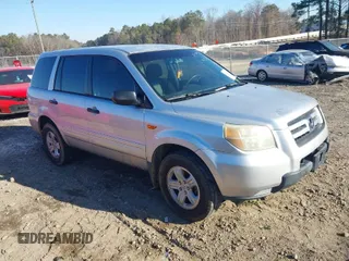 2006 Honda Pilot LX with VIN 2HKYF18106H559077, listed as a IAAI auction lot 41343743 with 239,924 mi miles. Bid and sale history available at carsss.com. Image 1.