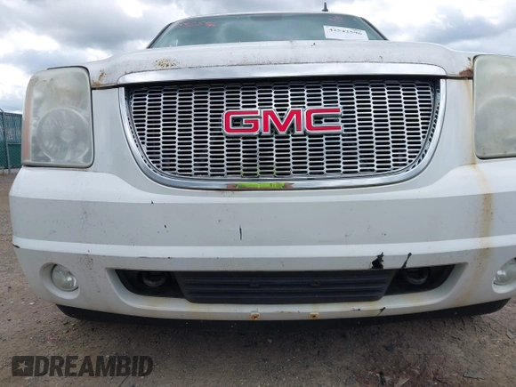 2011 GMC Yukon SLT z VIN 1GKS2CE07BR207565, wystawiony jako IAAI lot #42542596 z przebiegiem 217 759 mil mil oraz . Historia ofert i sprzedaży dostępna na DreamBid. Obrazek 12.