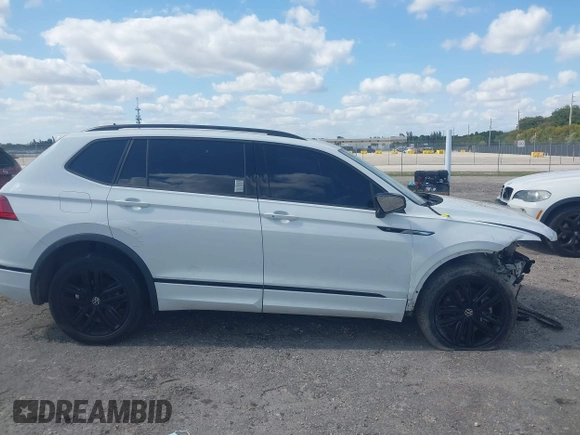 2022 Volkswagen Tiguan SE R-Line Black with VIN 3VVCB7AX5NM040222, listed as a IAAI auction lot 42073998 with 36,225 mi miles and . Bid and sale history available at DreamBid. Image 13.