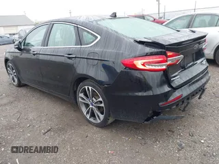 2019 Ford Fusion Titanium with VIN 3FA6P0D92KR125864, listed as a IAAI auction lot 42425422 with 109,340 mi miles and . Bid and sale history available at DreamBid. Image 3.