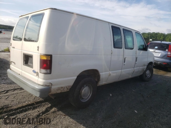 1992 Ford Econoline Cargo with VIN 1FTEE14Y2NHB57650, listed as a Copart auction lot 60258605 with 313,337 mi miles and Salvage title. Bid and sale history available at DreamBid. Image 3.