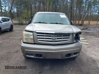 2002 Cadillac Escalade z VIN 1GYEK63N52R236906, wystawiony jako IAAI lot #41877028 z przebiegiem 185 348 mil mil oraz . Historia ofert i sprzedaży dostępna na DreamBid. Obrazek 13.