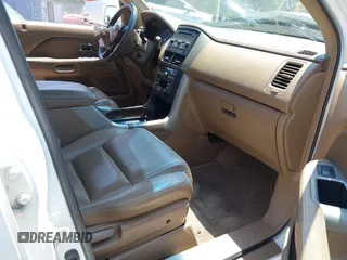 2007 Honda Pilot EX-L with VIN 5FNYF18587B000332, listed as a IAAI auction lot 42403191 with 192,771 mi miles and . Bid and sale history available at DreamBid. Image 5.