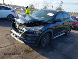 2019 Hyundai Tucson Sport z VIN KM8J33AL9KU878474, wystawiony jako IAAI lot #41568959 z przebiegiem 97 412 mil mil oraz . Historia ofert i sprzedaży dostępna na DreamBid. Obrazek 17.