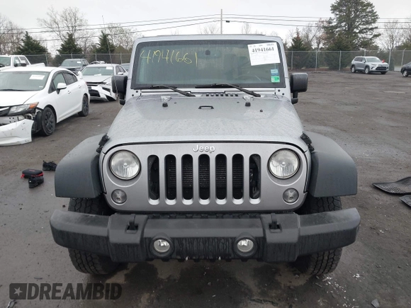 2015 Jeep Wrangler Sport with VIN 1C4AJWAG6FL501160, listed as a IAAI auction lot 41941661 with 134,842 mi miles. Bid and sale history available at carsss.com. Image 12.