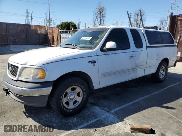 2000 Ford F-150 XL with VIN 1FTZX172XYNC01869, listed as a Copart auction lot 47414095 with 0 mi miles and Salvage Title. Bid and sale history available at carsss.com. Image 1.
