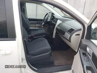 2010 Dodge Grand Caravan SXT with VIN 2D4RN5D17AR408112, listed as a IAAI auction lot 42128842 with 173,862 mi miles and . Bid and sale history available at DreamBid. Image 5.