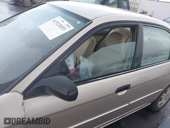 2001 Honda Civic LX with VIN JHMES16551S008933, listed as a IAAI auction lot 41912653 with 142,277 mi miles and . Bid and sale history available at DreamBid. Image 17.