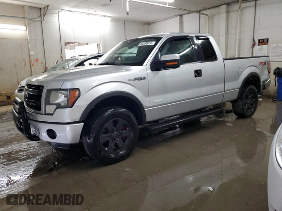 2014 Ford F-150 XL with VIN 1FTFX1ETXEFA46521, listed as a Copart auction lot 50233055 with 322,951 mi miles and Salvage Title. Bid and sale history available at carsss.com. Image 1.