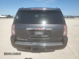 2015 GMC Yukon XL Denali with VIN 1GKS2JKJ3FR743050, listed as a Copart auction lot 50174675 with 143,154 mi miles and Salvage Title. Bid and sale history available at carsss.com. Image 6.