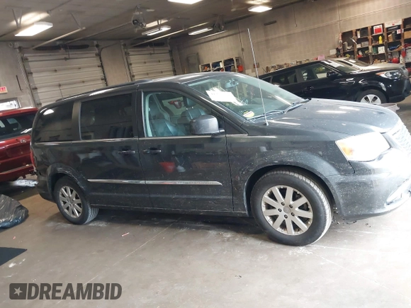 2012 Chrysler Town & Country Touring with VIN 2C4RC1BG5CR283049, listed as a IAAI auction lot 41237753 with 170,224 mi miles. Bid and sale history available at carsss.com. Image 13.