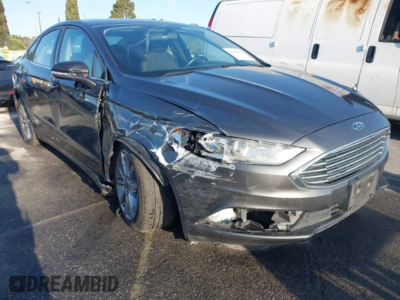 2017 Ford Fusion SE with VIN 3FA6P0HD4HR311462, listed as a IAAI auction lot 41824553 with 124,911 mi miles. Bid and sale history available at carsss.com. Image 1.