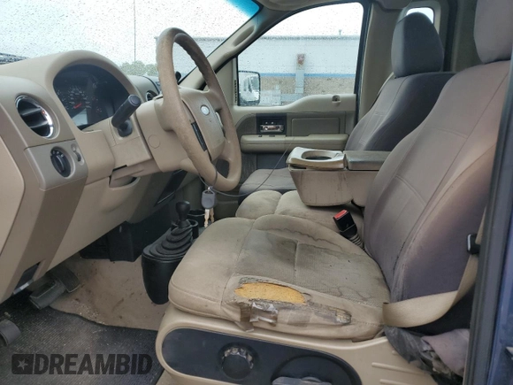 2005 Ford F-150 XLT z VIN 1FTRF04575KD80509, wystawiony jako Copart lot #58546475 z przebiegiem 157 668 mil mil oraz Czysty tytuł • Clean title. Historia ofert i sprzedaży dostępna na DreamBid. Obrazek 7.