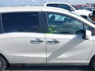 2018 Honda Odyssey EX with VIN 5FNRL6H57JB100035, listed as a IAAI auction lot 42582758 with 88,585 mi miles and . Bid and sale history available at DreamBid. Image 14.