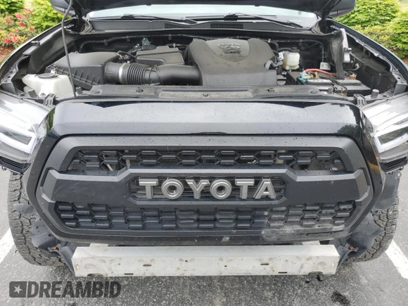 2022 Toyota Tacoma SR z VIN 3TYRZ5CN1NT016153, wystawiony jako Copart lot #56624785 z przebiegiem 88 633 mil mil oraz Czysty tytuł • Clean title. Historia ofert i sprzedaży dostępna na DreamBid. Obrazek 11.