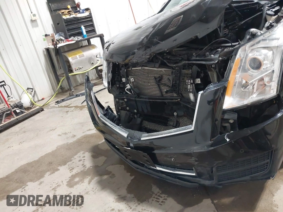 2016 Cadillac SRX Luxury Collection with VIN 3GYFNEE35GS514080, listed as a IAAI auction lot 42583744 with 88,935 mi miles and . Bid and sale history available at DreamBid. Image 6.