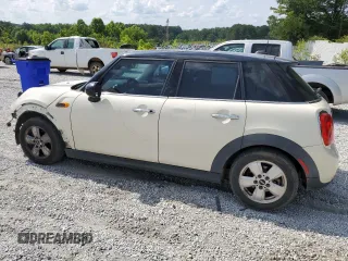 2016 MINI Hardtop 4 Door with VIN WMWXU1C59G2D08847, listed as a Copart auction lot 59763805 with 114,105 mi miles and Salvage title. Bid and sale history available at DreamBid. Image 2.