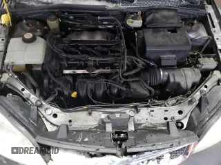 2005 Ford Focus S z VIN 3FAFP37N25R133770, wystawiony jako Copart lot #54927585 z przebiegiem 179 959 mil mil oraz Nie do naprawy. Historia ofert i sprzedaży dostępna na DreamBid. Obrazek 11.