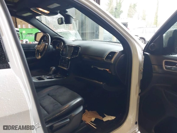 2019 Jeep Grand Cherokee Laredo E with VIN 1C4RJFAG1KC818289, listed as a IAAI auction lot 41602541 with 59,356 mi miles. Bid and sale history available at carsss.com. Image 5.