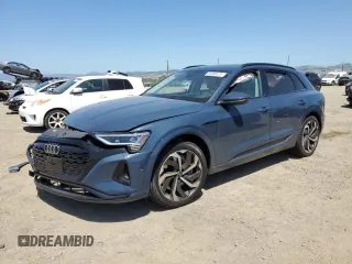 2024 Audi Q8 e-tron z VIN WA16AAGE4RB051463, wystawiony jako Copart lot #55693475 z przebiegiem Nie podano mil oraz Szkoda całkowita • Salvage title. Historia ofert i sprzedaży dostępna na DreamBid. Obrazek 1.