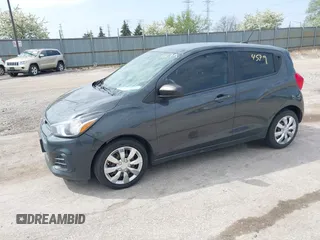 2017 Chevrolet Spark LS with VIN KL8CB6SA1HC819764, listed as a IAAI auction lot 42144579 with 123,023 mi miles. Bid and sale history available at carsss.com. Image 2.