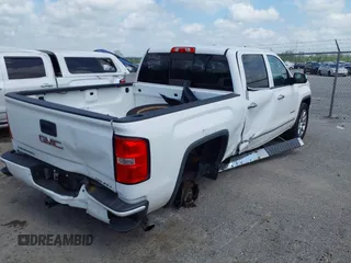 2014 GMC Sierra 1500 Denali z VIN 3GTP1WEC3EG421005, wystawiony jako IAAI lot #41936295 z przebiegiem 188 918 mil mil oraz . Historia ofert i sprzedaży dostępna na DreamBid. Obrazek 4.