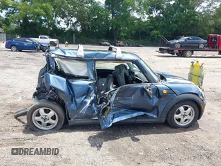2009 MINI Hardtop with VIN WMWMF33509TU74290, listed as a IAAI auction lot 42538919 with 104,209 mi miles and . Bid and sale history available at DreamBid. Image 13.