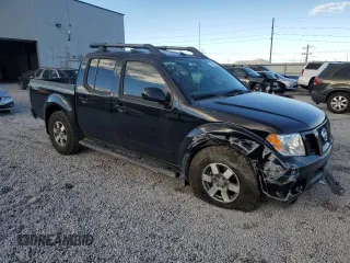 2011 Nissan Frontier Pro-4X with VIN 1N6AD0EV8BC427339, listed as a Copart auction lot 88293455 with 99,856 mi miles and Salvage title. Bid and sale history available at DreamBid. Image 4.