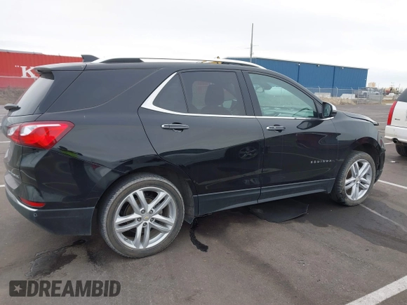 2021 Chevrolet Equinox Premier z VIN 2GNAXXEV4M6118442, wystawiony jako IAAI lot #41392148 z przebiegiem 92 170 mil mil oraz . Historia ofert i sprzedaży dostępna na DreamBid. Obrazek 14.