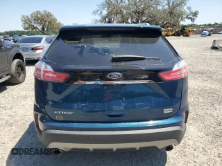 2020 Ford Edge SEL z VIN 2FMPK3J9XLBA59093, wystawiony jako Copart lot #52542645 z przebiegiem 128 059 mil mil oraz Czysty tytuł • Clean title. Historia ofert i sprzedaży dostępna na DreamBid. Obrazek 6.