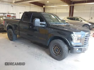 2015 Ford F-150 XLT z VIN 1FTFX1EFXFKE32133, wystawiony jako IAAI lot #42260644 z przebiegiem 136 724 mil mil oraz . Historia ofert i sprzedaży dostępna na DreamBid. Obrazek 1.