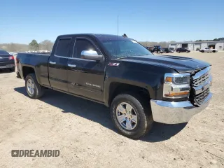 2018 Chevrolet Silverado 1500 LT with VIN 1GCRCREC3JZ176351, listed as a Copart auction lot 49270095 with 146,608 mi miles and Salvage Title. Bid and sale history available at DreamBid. Image 4.