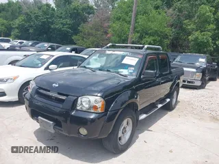 2001 Nissan Frontier SE with VIN 1N6ED27T81C305653, listed as a IAAI auction lot 42260643 with 245,547 mi miles and . Bid and sale history available at DreamBid. Image 2.