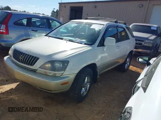 1999 Lexus RX 300 Luxury SUV with VIN JT6HF10U2X0076430, listed as a IAAI auction lot 41389012 with 257,695 mi miles. Bid and sale history available at carsss.com. Image 2.
