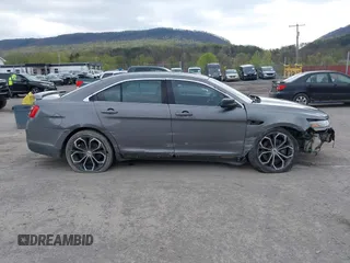 2014 Ford Taurus SHO with VIN 1FAHP2KTXEG160800, listed as a IAAI auction lot 42083237 with 75,048 mi miles. Bid and sale history available at carsss.com. Image 14.