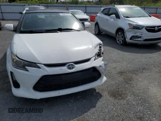 2014 Scion tC z VIN JTKJF5C70E3084697, wystawiony jako Copart lot #54307295 z przebiegiem 174 073 mil mil oraz Szkoda całkowita • Salvage title. Historia ofert i sprzedaży dostępna na DreamBid. Obrazek 5.