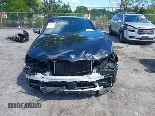 2019 BMW 5 Series M550i xDrive with VIN WBAJB9C51KB289355, listed as a IAAI auction lot 41867984 with 30,106 mi miles and . Bid and sale history available at DreamBid. Image 6.