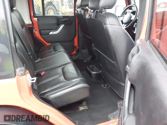 2015 Jeep Wrangler Unlimited Sahara with VIN 1C4BJWEG6FL603265, listed as a IAAI auction lot 41956606 with 70,983 mi miles. Bid and sale history available at carsss.com. Image 8.