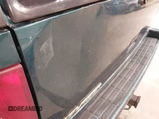 1997 Chevrolet Blazer LS z VIN 1GNDT13W9V2208184, wystawiony jako IAAI lot #42156700 z przebiegiem 251 216 mil mil oraz . Historia ofert i sprzedaży dostępna na DreamBid. Obrazek 6.