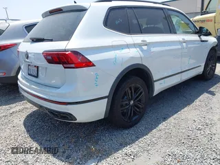 2022 Volkswagen Tiguan SE R-Line Black z VIN 3VVCB7AX1NM078210, wystawiony jako IAAI lot #42374836 z przebiegiem 37 774 mil mil oraz . Historia ofert i sprzedaży dostępna na DreamBid. Obrazek 4.