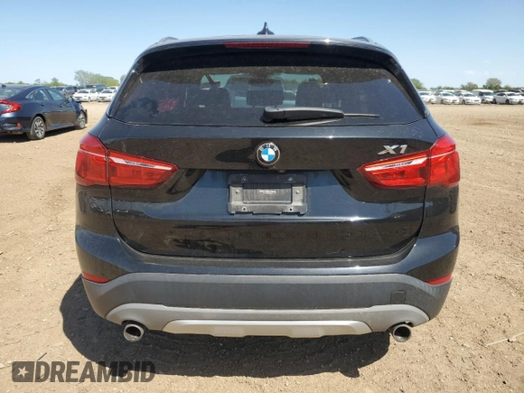 2018 BMW X1 xDrive28i with VIN WBXHT3C38J5K28174, listed as a Copart auction lot 57333385 with 50,064 mi miles and Salvage title. Bid and sale history available at DreamBid. Image 6.
