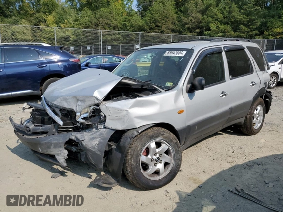 2003 Mazda Tribute DX with VIN 4F2YZ02B83KM52472, listed as a Copart auction lot 68642804 with 179,193 mi miles and Salvage Title. Bid and sale history available at carsss.com. Image 1.