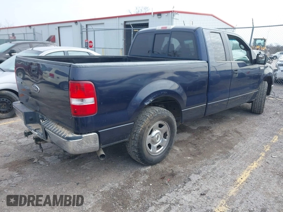 2005 Ford F-150 XLT with VIN 1FTPX12565NA61341, listed as a IAAI auction lot 41693609 with 401,988 mi miles. Bid and sale history available at carsss.com. Image 4.