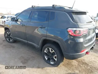 2017 Jeep Compass Trailhawk with VIN 3C4NJDDBXHT657425, listed as a IAAI auction lot 41022289 with 83,003 mi miles and . Bid and sale history available at DreamBid. Image 3.