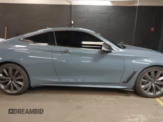 2022 Infiniti Q60 Red Sport 400 with VIN JN1FV7LL4NM681132, listed as a IAAI auction lot 40733343 with 14,309 mi miles and . Bid and sale history available at DreamBid. Image 13.