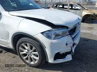 2016 BMW X5 sDrive35i with VIN 5UXKR2C55G0H43136, listed as a IAAI auction lot 41835931 with 125,751 mi miles. Bid and sale history available at carsss.com. Image 17.