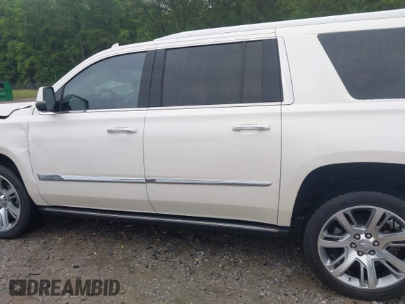 2015 Cadillac Escalade ESV Premium z VIN 1GYS4TKJ6FR708255, wystawiony jako IAAI lot #42244621 z przebiegiem 31 407 mil mil oraz . Historia ofert i sprzedaży dostępna na DreamBid. Obrazek 15.
