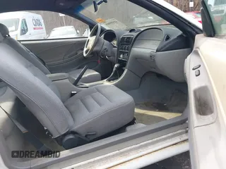 1997 Ford Mustang with VIN 1FALP4040VF200826, listed as a IAAI auction lot 41555969 with 82,134 mi miles. Bid and sale history available at carsss.com. Image 5.