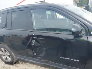 2016 Jeep Compass Latitude with VIN 1C4NJDEB2GD746067, listed as a IAAI auction lot 40512860 with 119,360 mi miles. Bid and sale history available at carsss.com. Image 14.